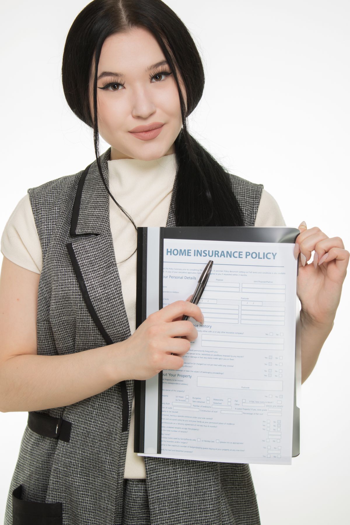 Woman pointing to a home policy document, illustrating a home warranty claim denied review